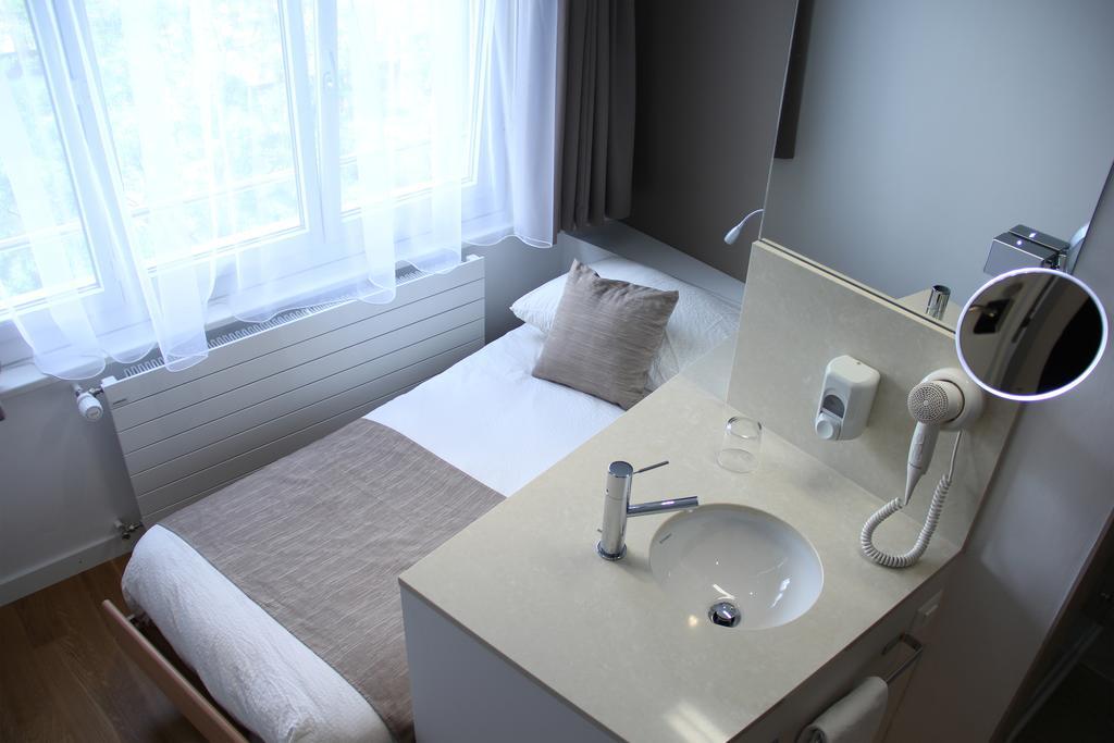 Hôtel Elite Sion Kamer foto